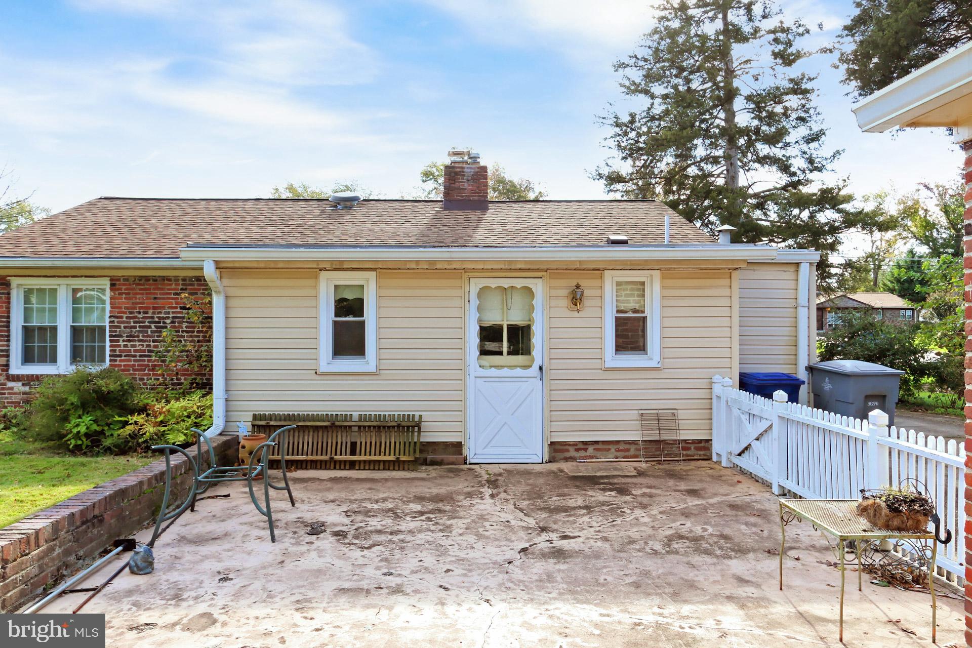 1806 Shenandoah Road Alexandria, VA 22308 - Photo 28 of 33 a view of house with backyard and sitting area