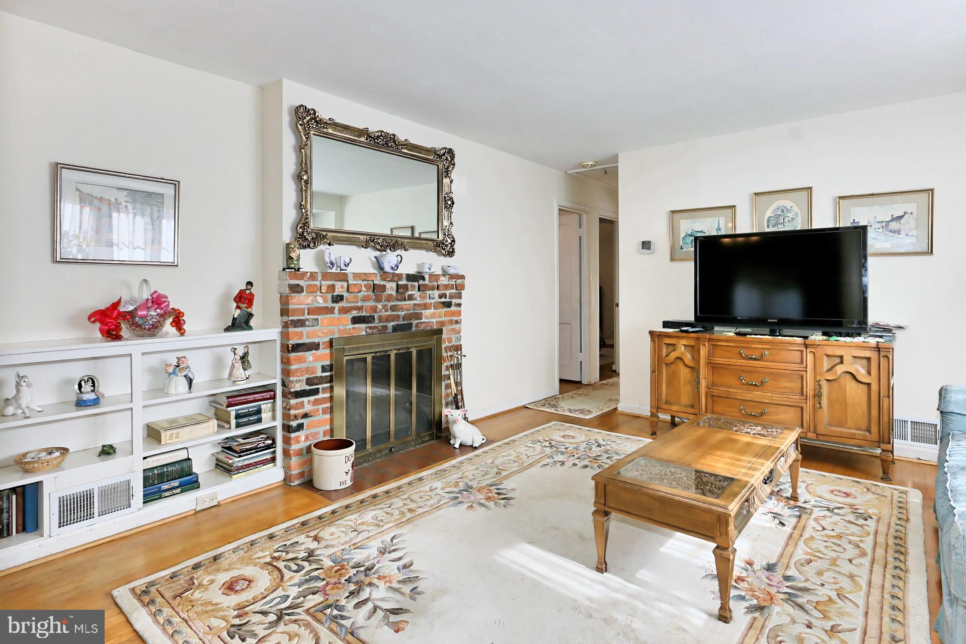 1806 Shenandoah Road Alexandria, VA 22308 - Photo 5 of 33 a living room with furniture and a flat screen tv