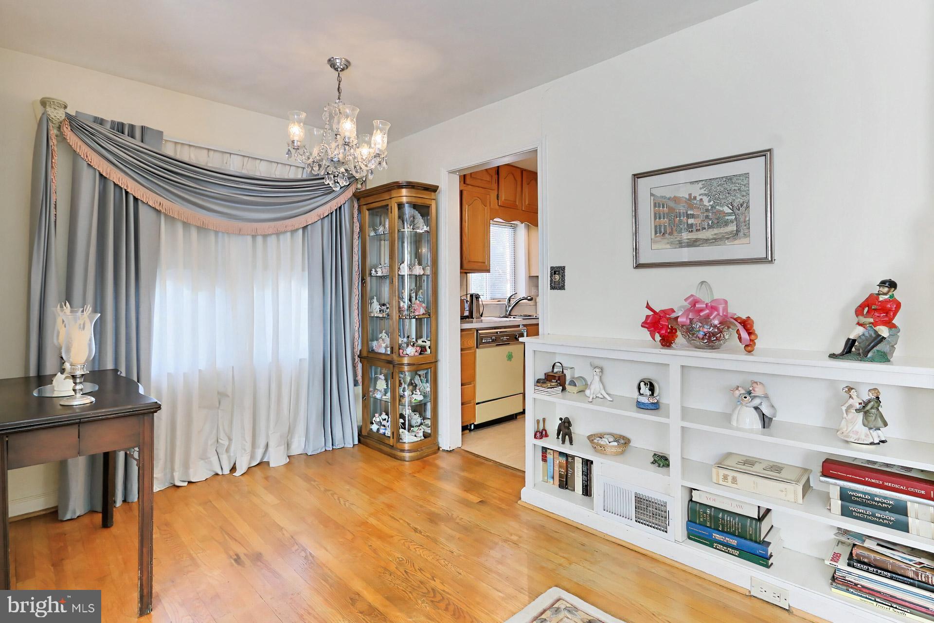 1806 Shenandoah Road Alexandria, VA 22308 - Photo 9 of 33 a bedroom with furniture and a chandelier