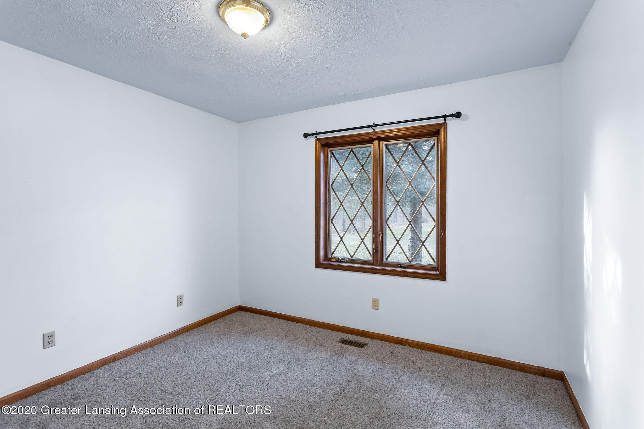 13065 Center Road Bath, MI 48808 - Photo 17 of 20 bedroom3
