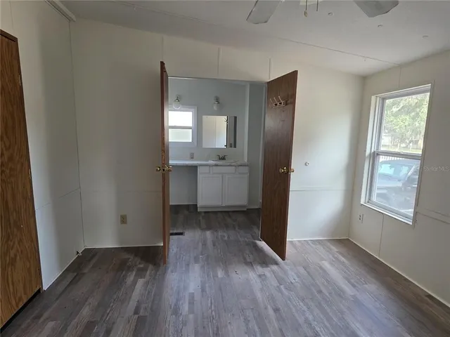 an empty room with windows