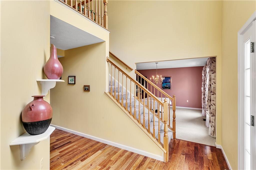 229 Field Club Circle McKees Rocks, PA 15136 - Photo 14 of 34 a view of entryway and hall with wooden floor