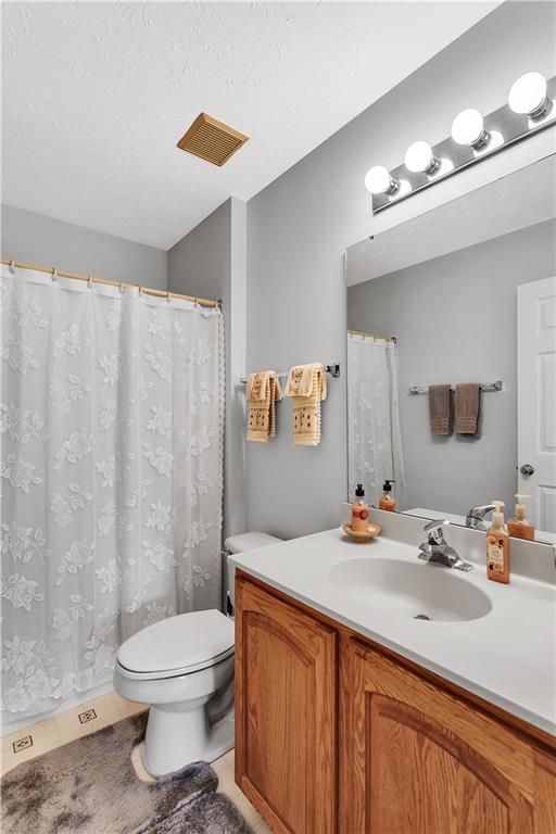 229 Field Club Circle McKees Rocks, PA 15136 - Photo 23 of 34 a bathroom with a sink a toilet and shower
