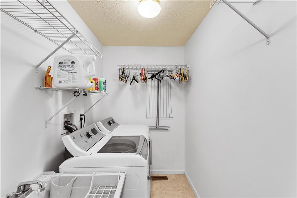 229 Field Club Circle McKees Rocks, PA 15136 - Photo 27 of 34 a utility room with dryer and washer