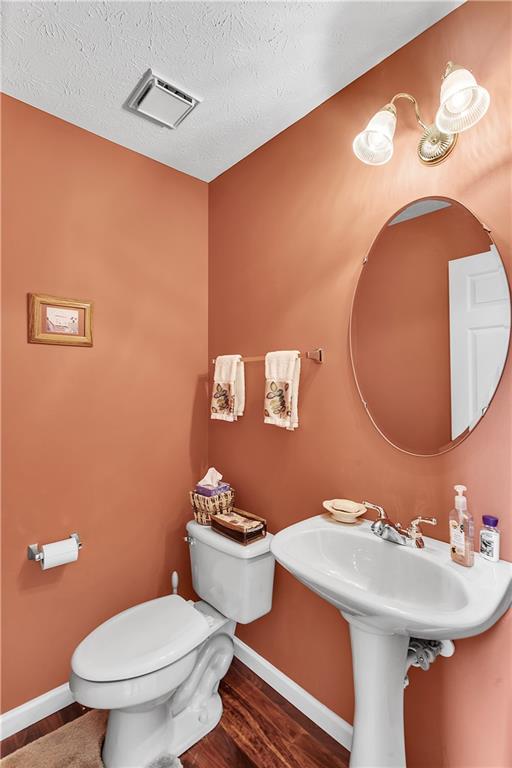 229 Field Club Circle McKees Rocks, PA 15136 - Photo 28 of 34 a bathroom with a sink mirror and toilet
