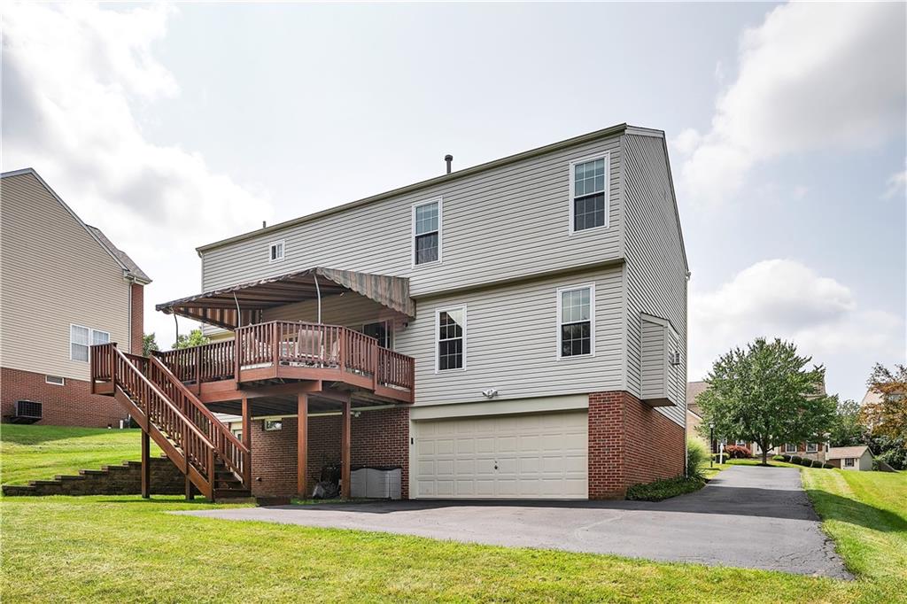 229 Field Club Circle McKees Rocks, PA 15136 - Photo 29 of 34 a view of a house with a backyard