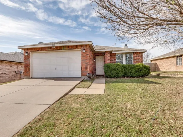 a house view with a backyard space
