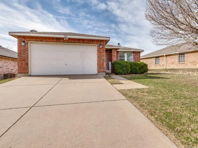 a front view of house with yard