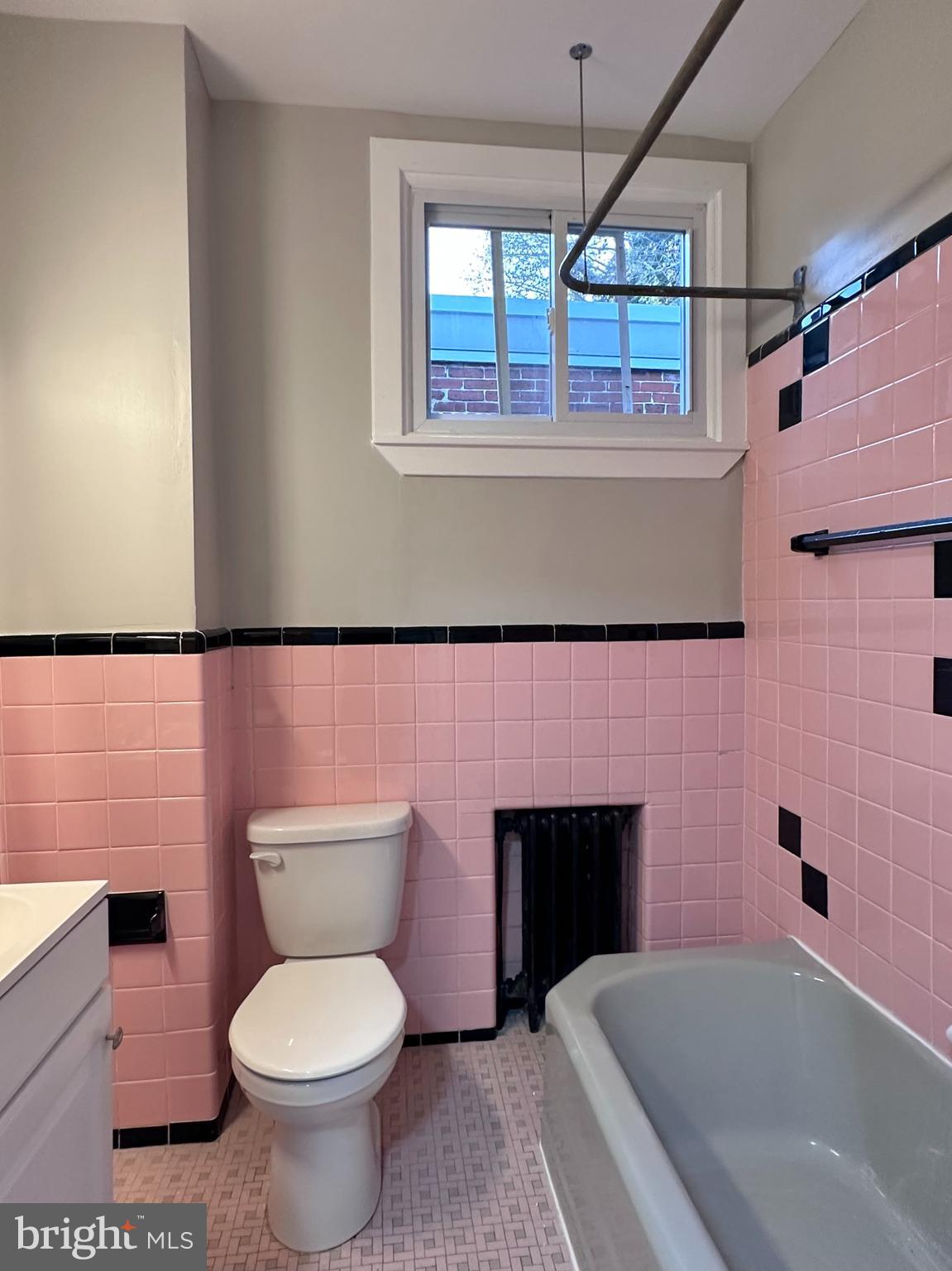 934 North Fallon Street Philadelphia, PA 19131 - Photo 17 of 26 a bathroom with a toilet a sink and bathtub