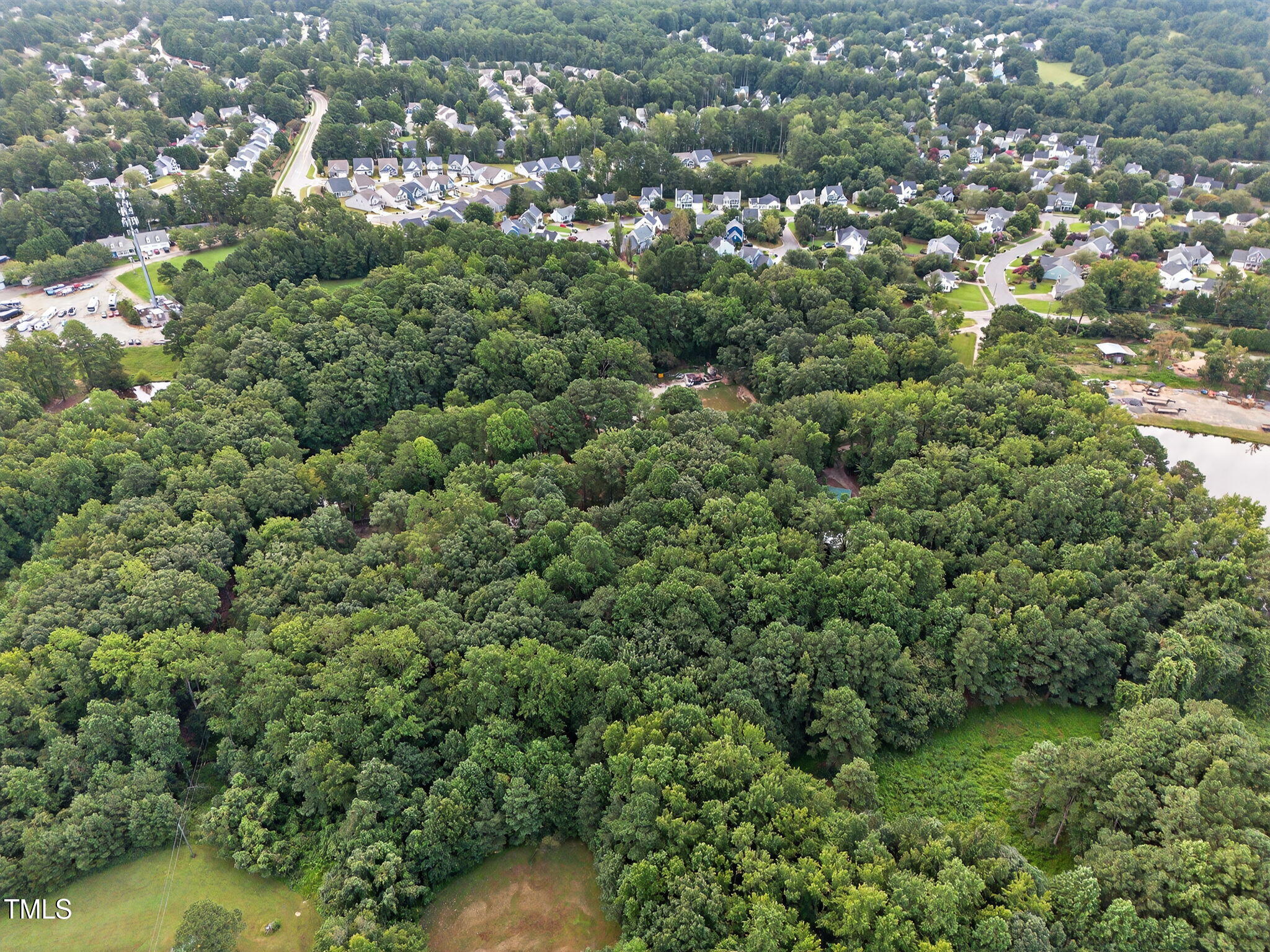 709 Oak Ridge Drive Cary, NC 27519 - Photo 18 of 30 an aerial view of residential houses with outdoor space and trees