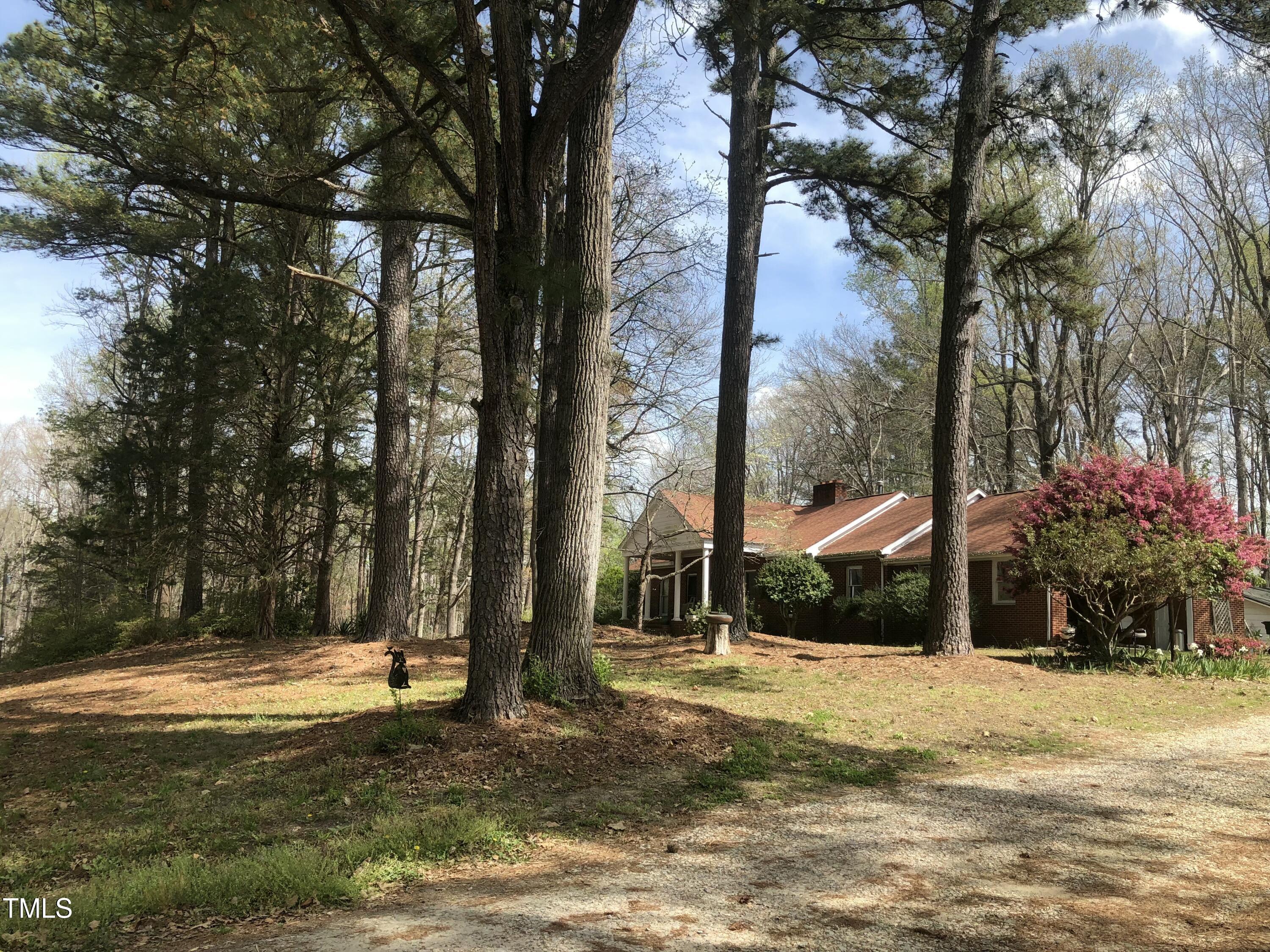 709 Oak Ridge Drive Cary, NC 27519 - Photo 23 of 30 a view of a house with a yard