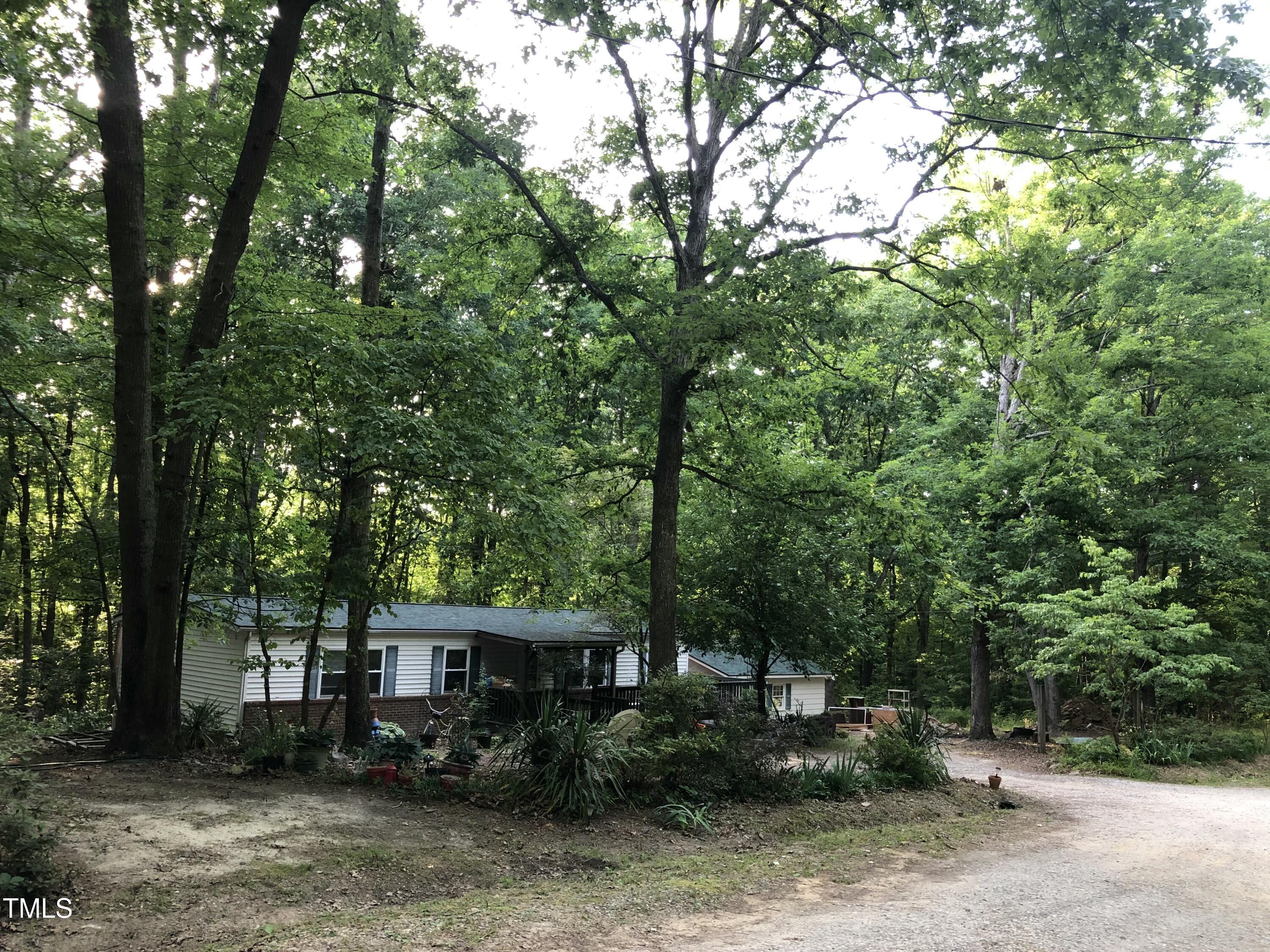 709 Oak Ridge Drive Cary, NC 27519 - Photo 30 of 30 a view of a house with a tree