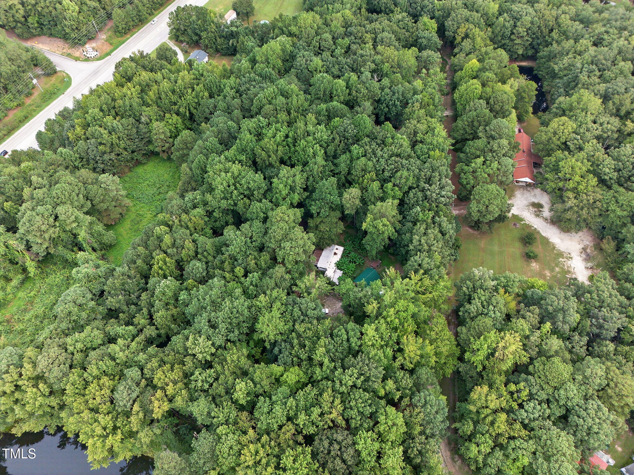 709 Oak Ridge Drive Cary, NC 27519 - Photo 6 of 30 an aerial view of residential house with outdoor space and trees all around