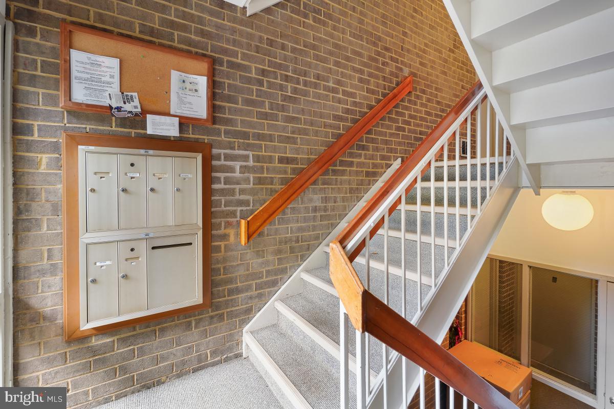 2102 Green Watch Way, Unit 301 Reston, VA 20191 - Photo 3 of 32 a view of entryway with wooden floor