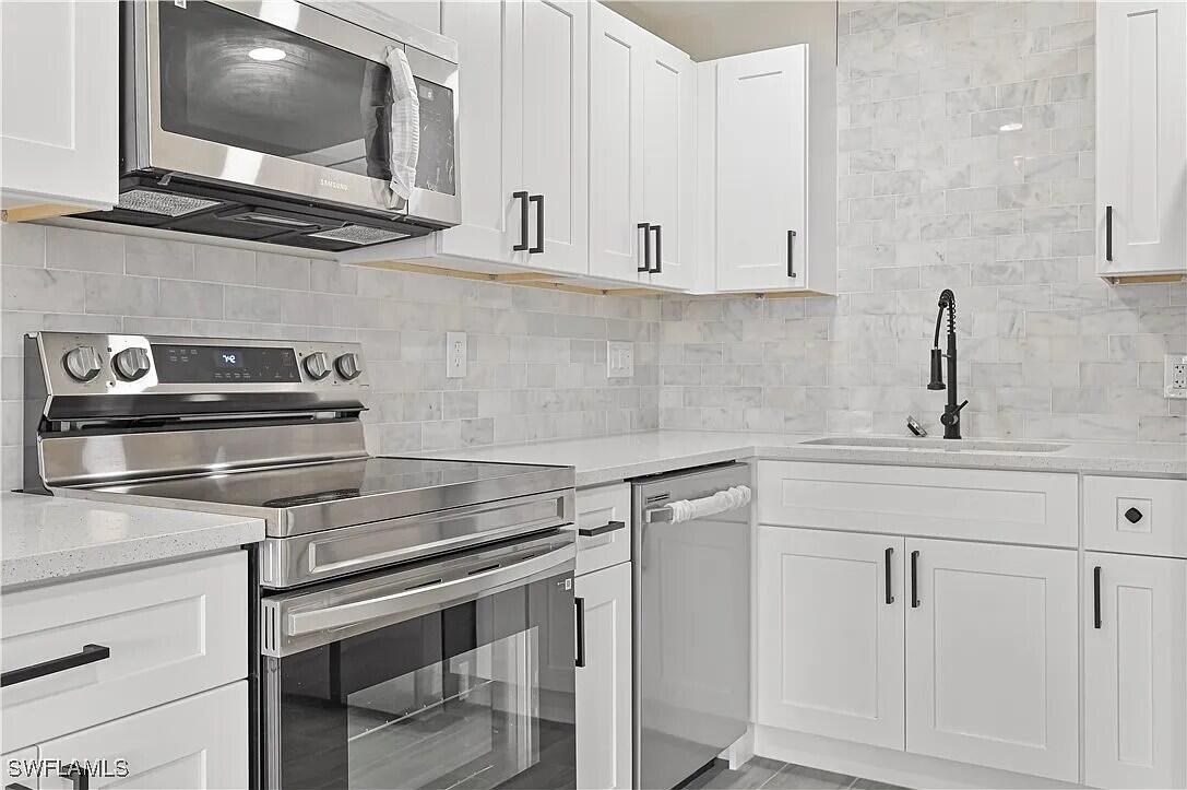4733 28th Street Southwest Lehigh Acres, FL 33973 - Photo 2 of 10 Kitchen 2 - Copy