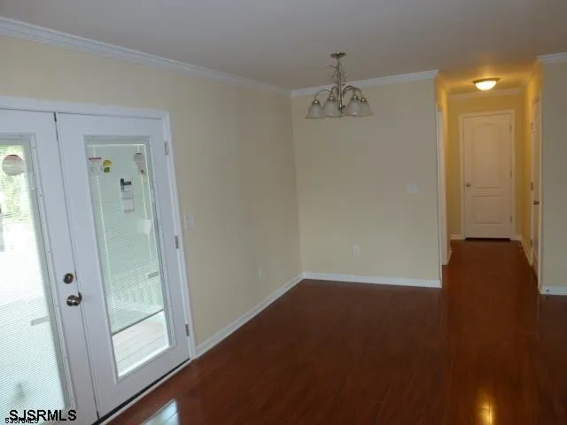 a view of a hallway with closet