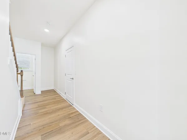 a view of staircase with white walls and white walls