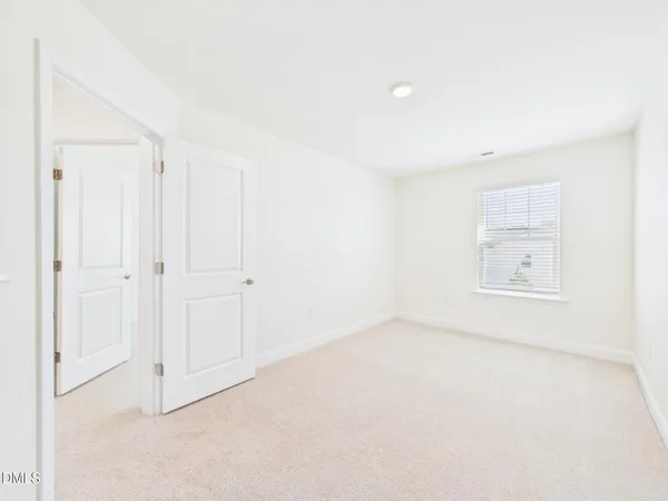 a white toilet sitting next to a bath tub shower