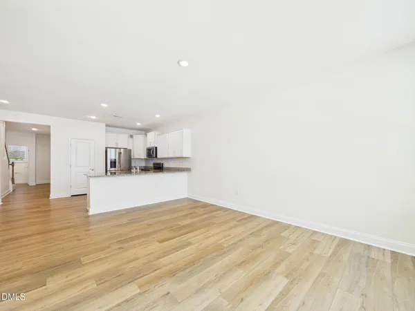 a view of kitchen with wooden floor