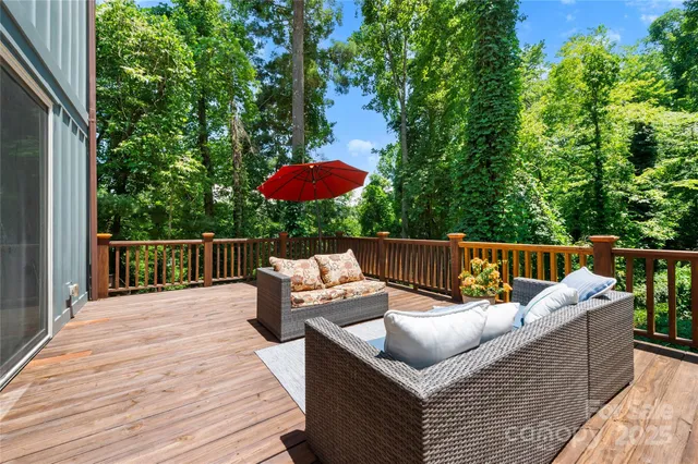 swimming pool view with a seating space