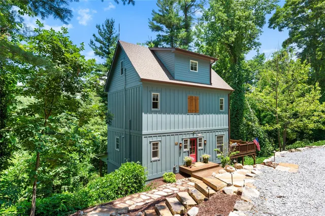 a backyard of a house with seating space