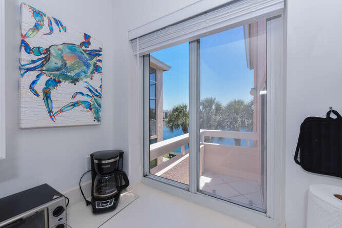 353 Highway 1, Unit F306 Jupiter, FL 33477 - Photo 12 of 43 a view of a hallway with workspace