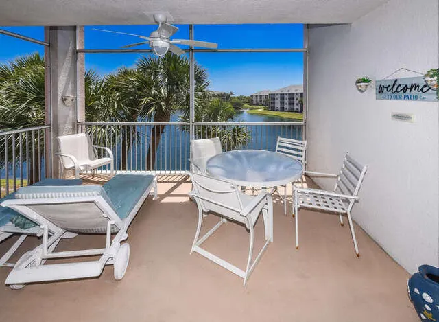 a view of a lake with a yard