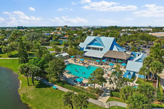 an aerial view of residential building and ocean