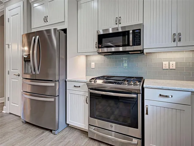 a view of a park with plants and trees