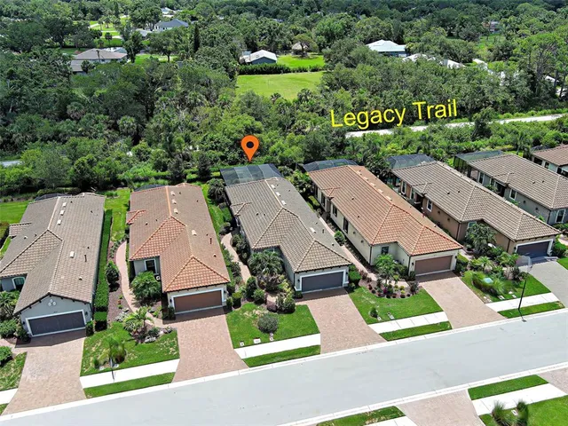 a kitchen with stainless steel appliances granite countertop white cabinets a sink and dishwasher