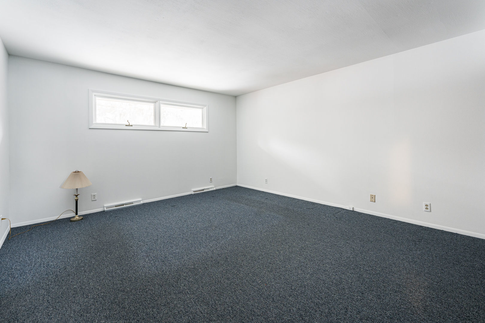 519 Normal Road DeKalb, IL 60115 - Photo 20 of 43 a view of an empty room with a window