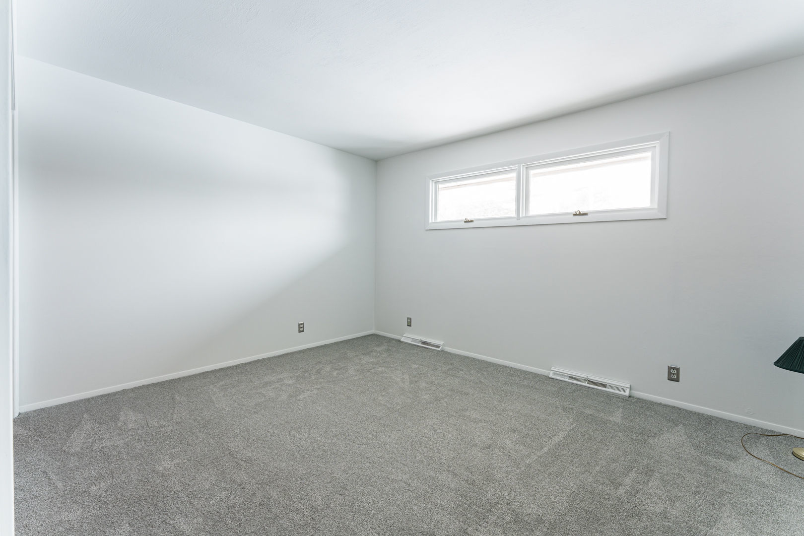 519 Normal Road DeKalb, IL 60115 - Photo 28 of 43 an empty room with a empty space and window