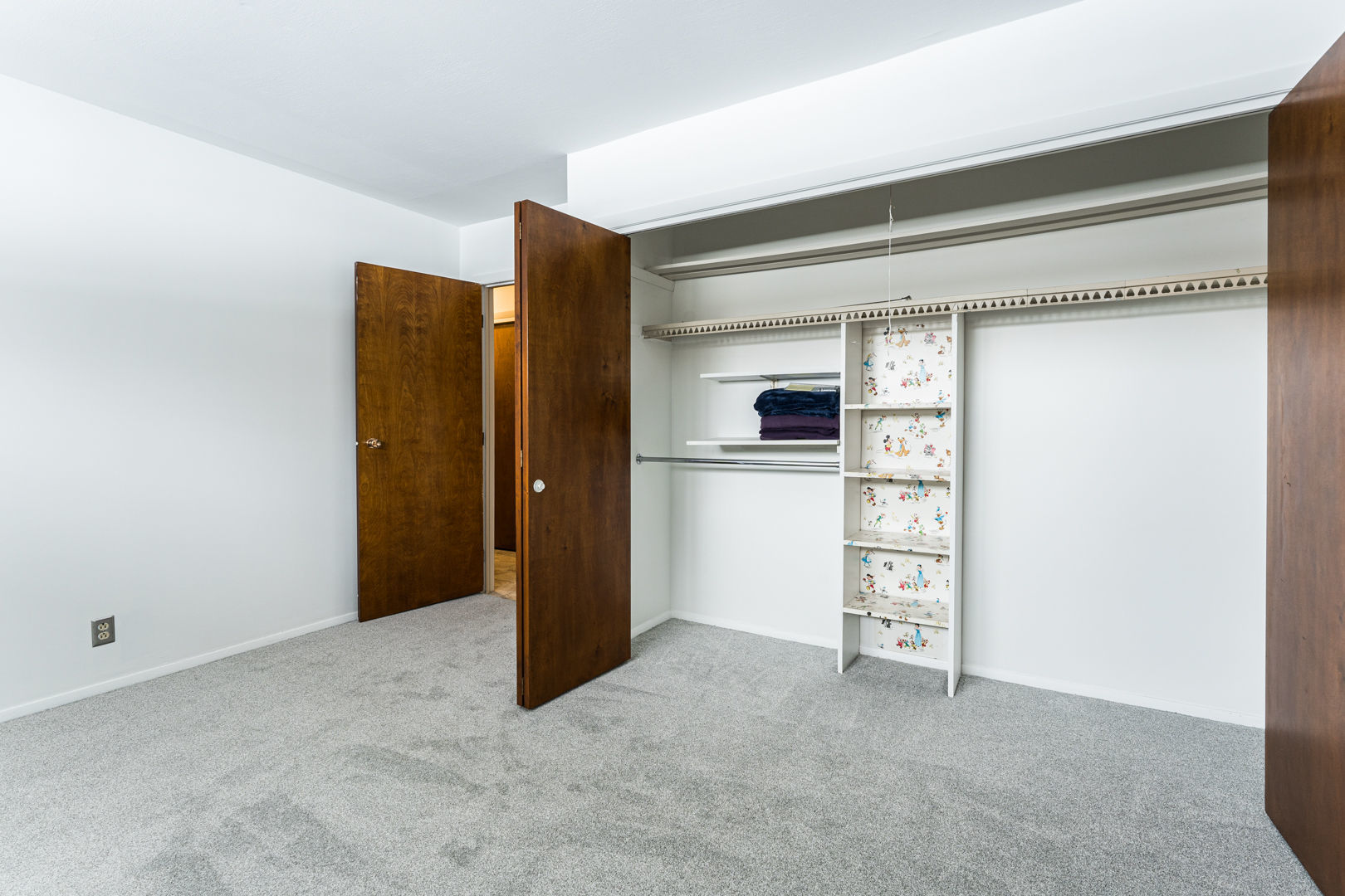 519 Normal Road DeKalb, IL 60115 - Photo 29 of 43 an empty room with closet and windows