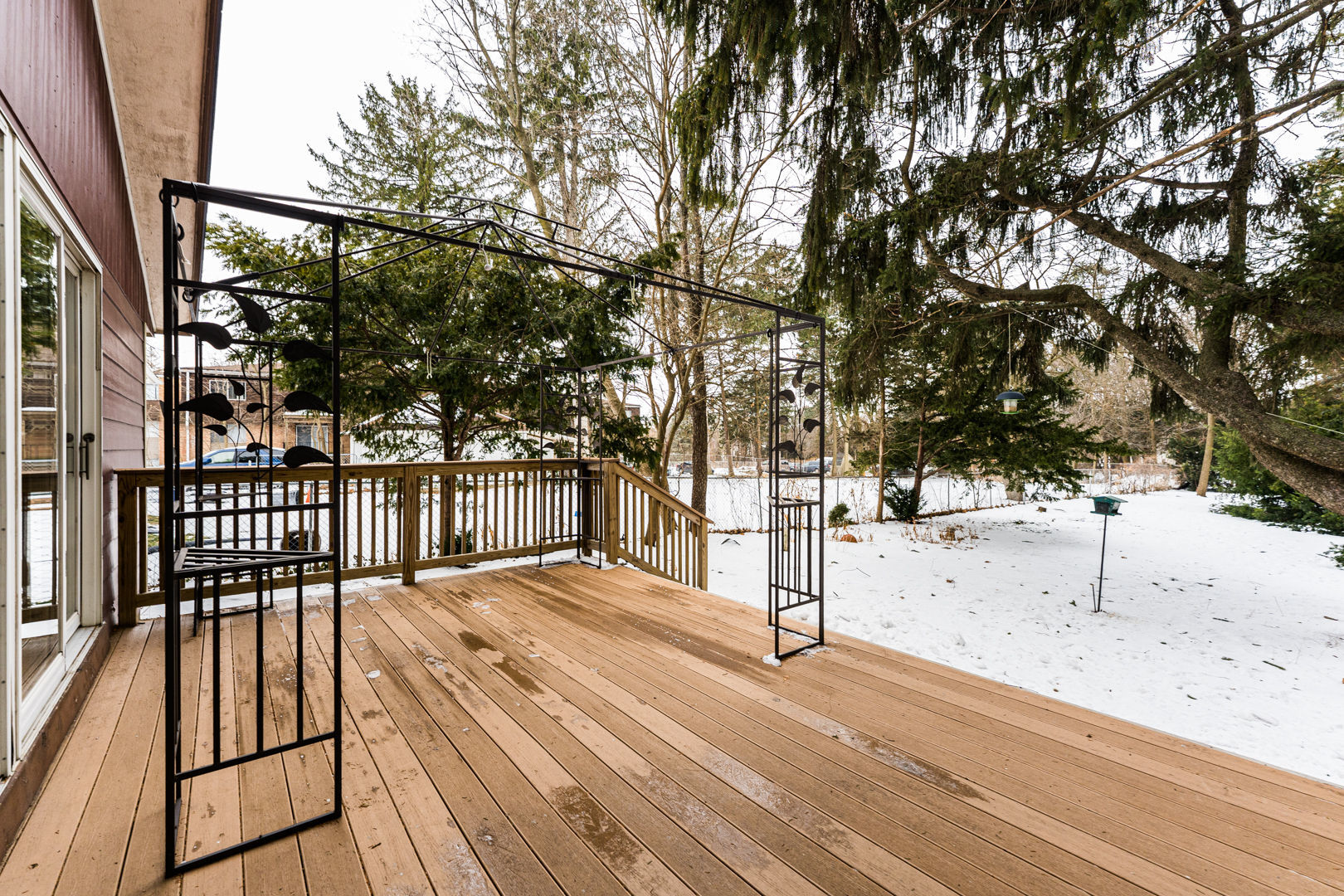 519 Normal Road DeKalb, IL 60115 - Photo 37 of 43 a view of a backyard with wooden fence and large trees