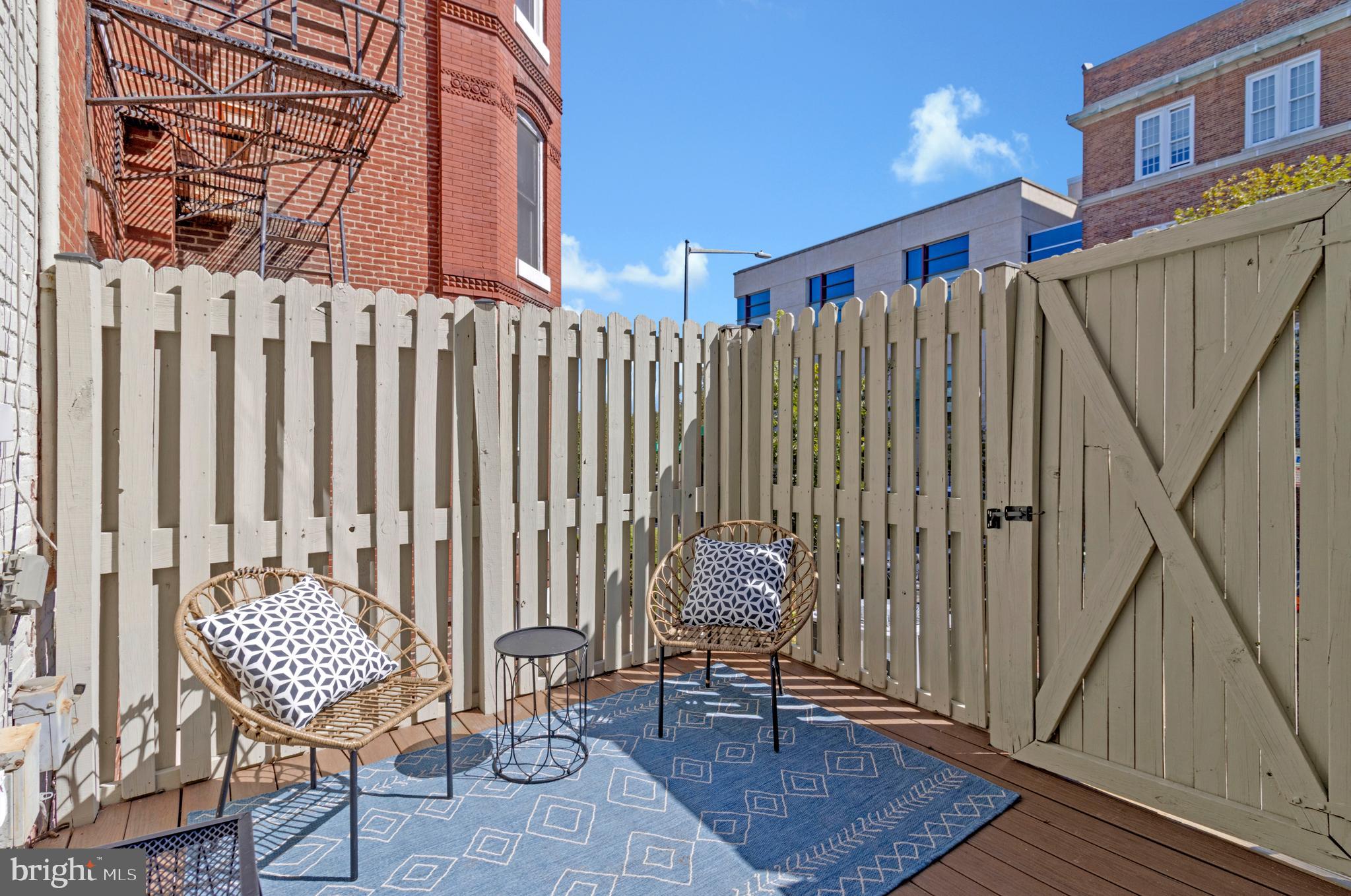 334 E Street Northeast Washington, DC 20002 - Photo 27 of 32 a view of a chair with a rug