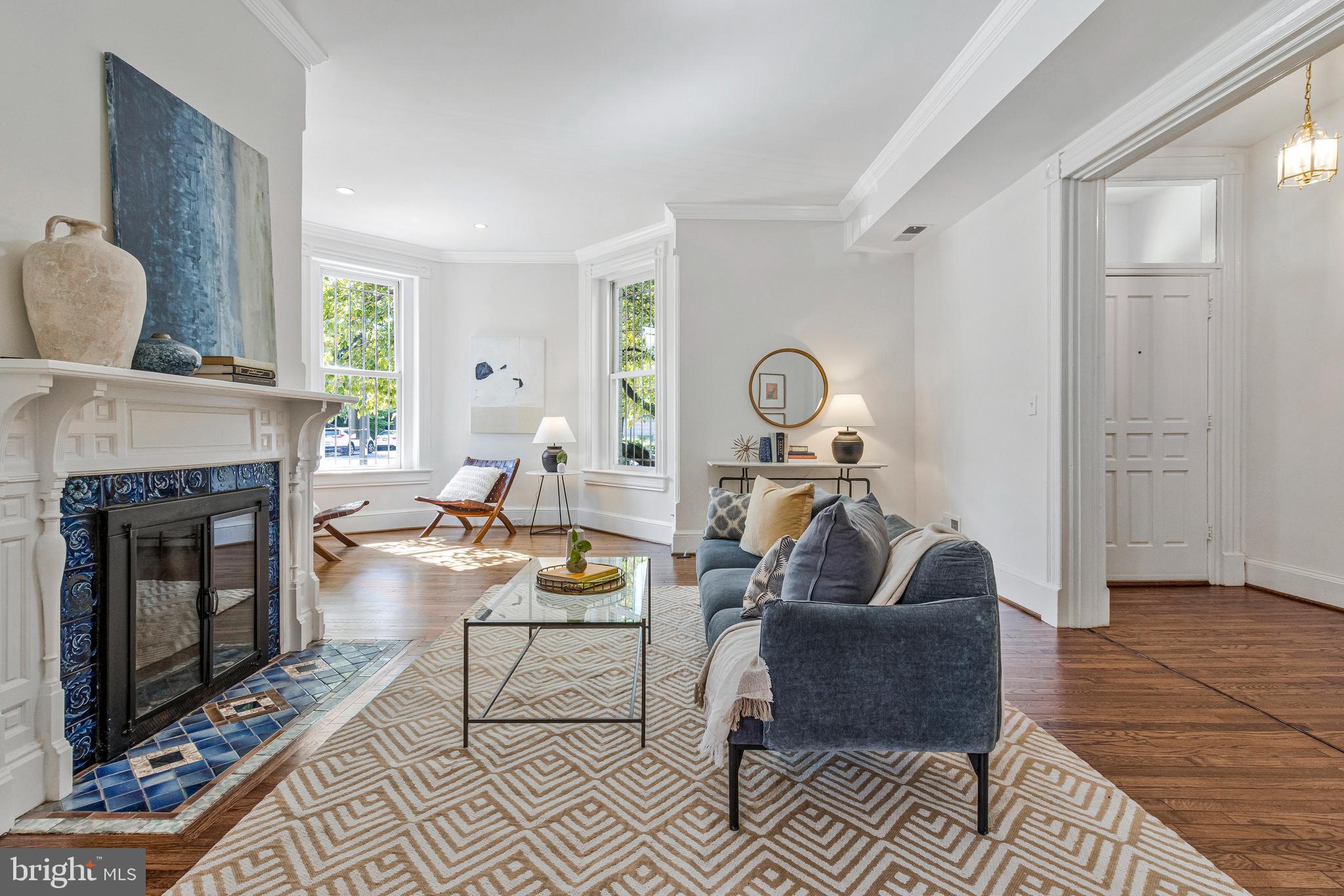 334 E Street Northeast Washington, DC 20002 - Photo 5 of 32 a living room with furniture and a fireplace