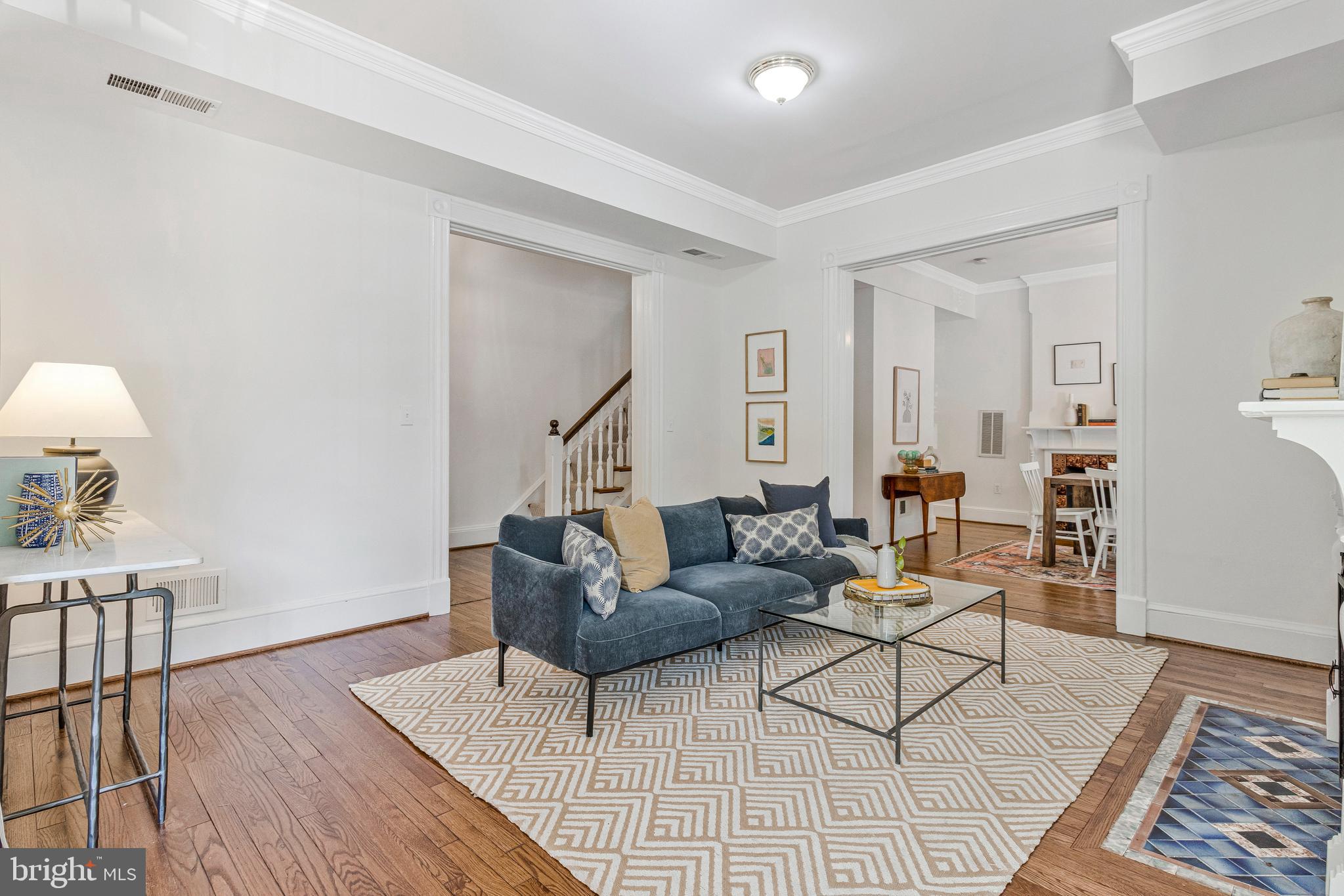 334 E Street Northeast Washington, DC 20002 - Photo 7 of 32 a living room with furniture and a wooden floor