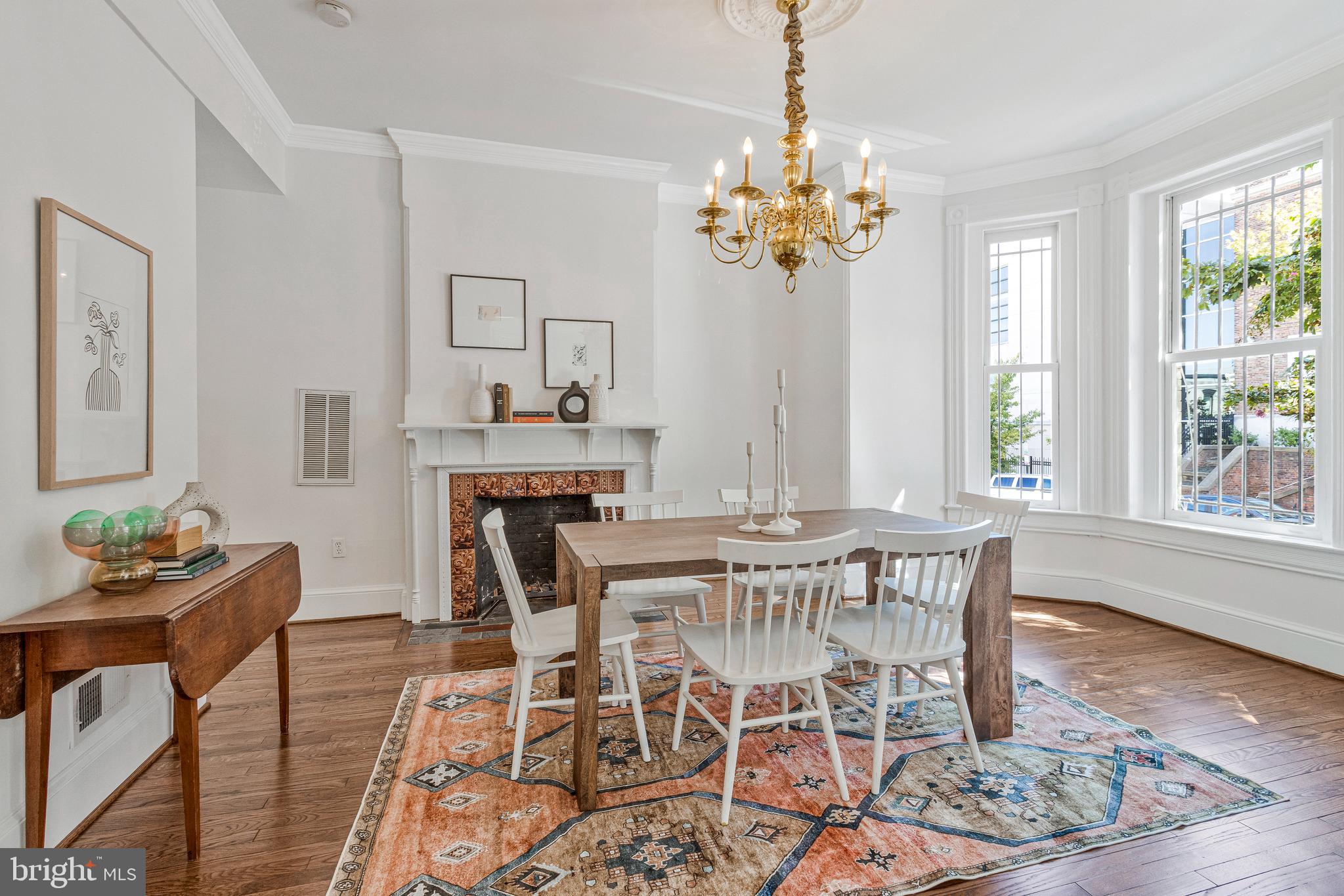 334 E Street Northeast Washington, DC 20002 - Photo 9 of 32 a view of a dining room with furniture window and wooden floor