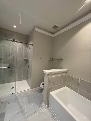 a view of a car parked in front of a house