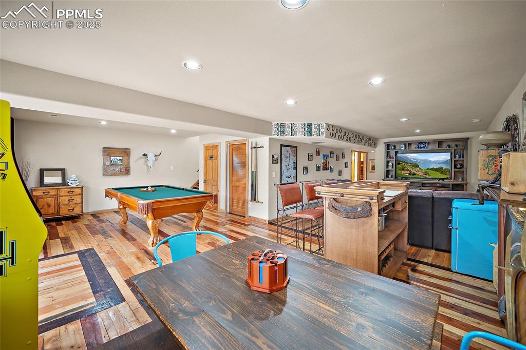 9845 Mesa Road Cascade, CO 80809 - Photo 19 of 50 a living room with lots of furniture and kitchen view