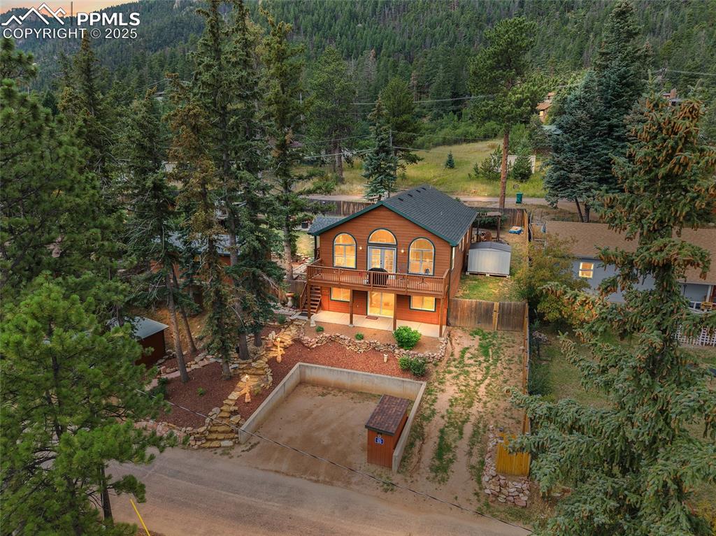 9845 Mesa Road Cascade, CO 80809 - Photo 39 of 50 an aerial view of a house with a big yard