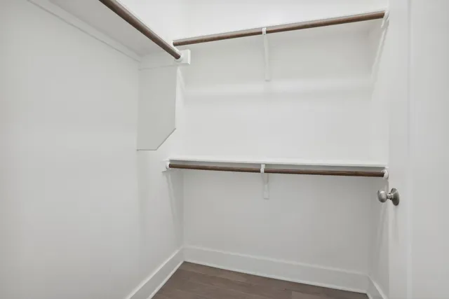 a view of an empty walk in closet