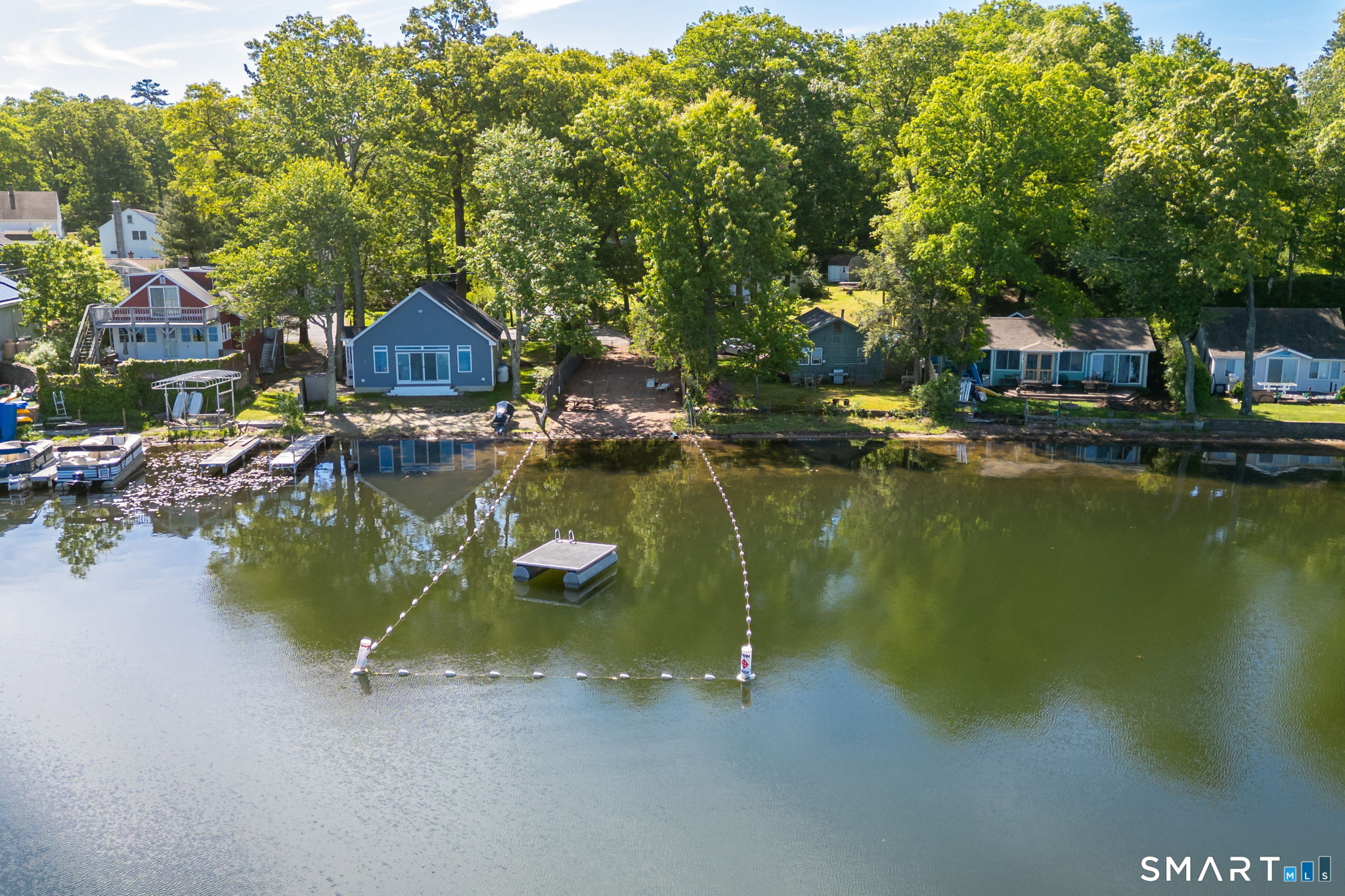 347 Griffin Road Suffield, CT 06093 - Photo 34 of 35 a view of a lake with a house swimming pool and outdoor space