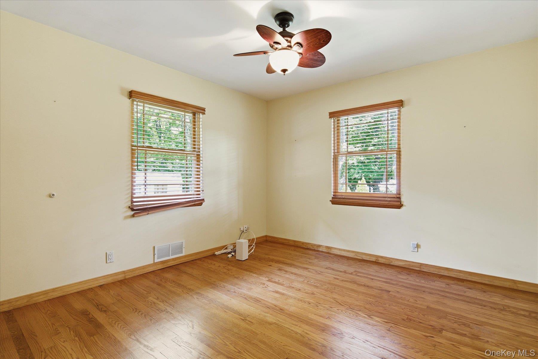 42 Cliff Road Port Jefferson, NY 11777 - Photo 16 of 22 an empty room with a window