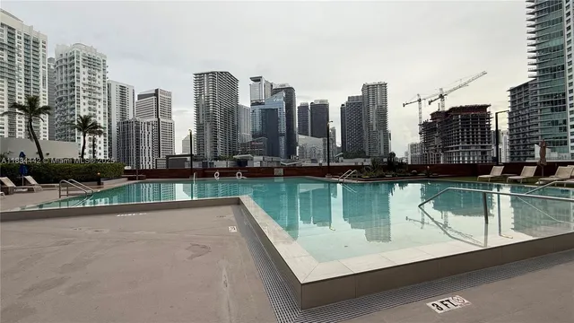 a view of a city with tall buildings