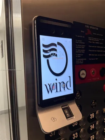a bathroom with a mirror and a sink