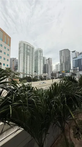 a view of a city with tall buildings