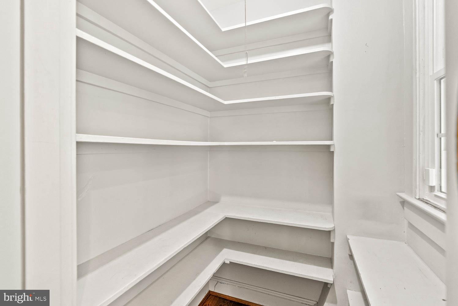 7406 Brookville Road Chevy Chase, MD 20815 - Photo 23 of 72 a view of an empty walk in closet