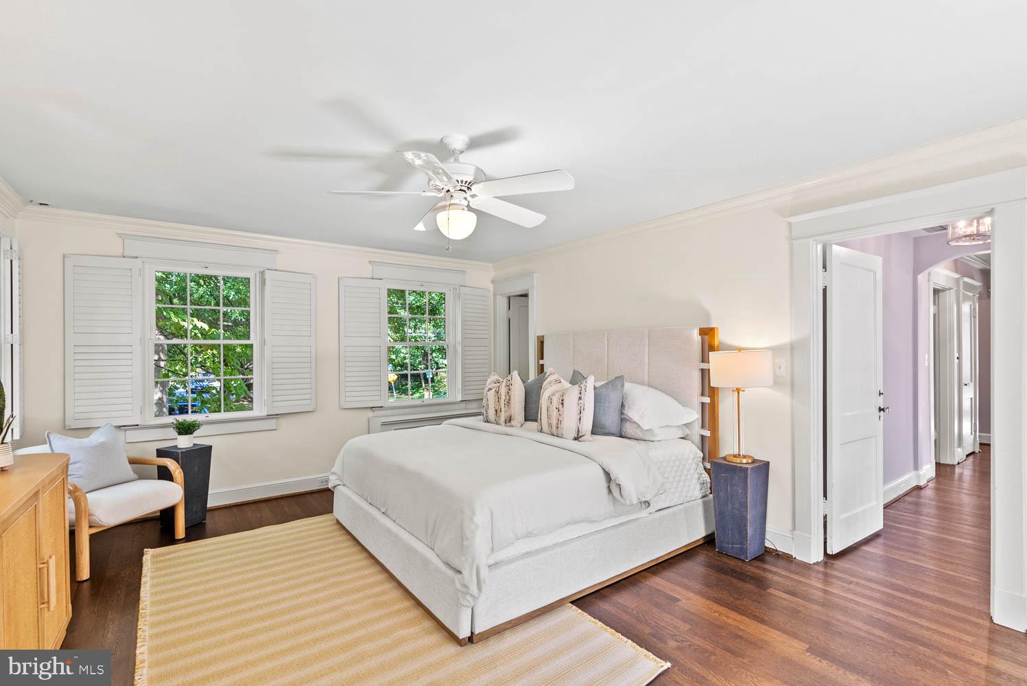 7406 Brookville Road Chevy Chase, MD 20815 - Photo 27 of 72 a bedroom with a large bed and a window