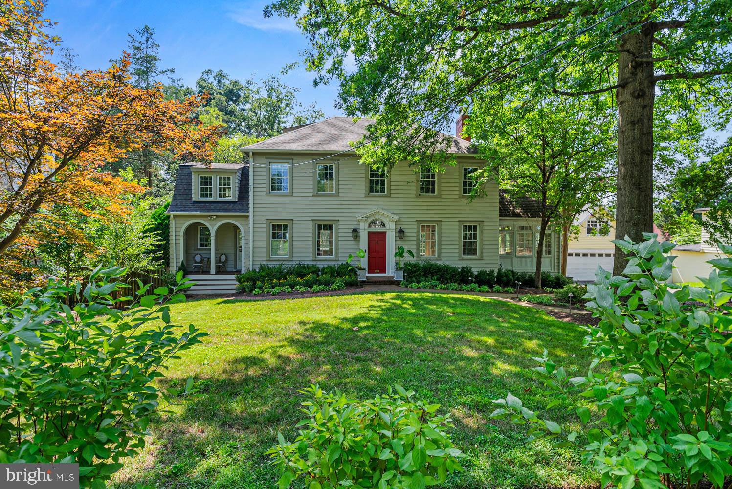 7406 Brookville Road Chevy Chase, MD 20815 - Photo 3 of 72 front view of a house with a big yard
